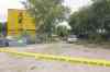 TREVOR HAGAN / WINNIPEG FREE PRESS files 
Winnipeg police behind the now-demolished vacant warehouse on Main Street in August 2011.
