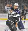 Mark terrill / the associated press files
All-time Thrashers/Jets franchise penalty leader Chris Thorburn winds up to launch a haymaker at Los Angeles Kings forward Kyle Clifford.