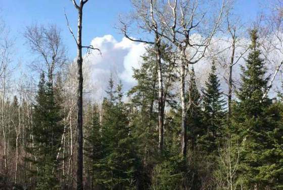 FACEBOOK PHOTO / ONTARIO STORM TRACKERCrews were fighting a forest fire near the Manitoba-Ontario border Thursday evening.