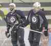 JOE BRYKSA / WINNIPEG FREE PRESS files
Winnipeg Jets defenceman/forward Dustin Byfuglien (left) says dressing-room drama has waned since the big trade.