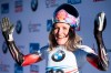 Mirela Rahneva from Canada celebrates winning the women's Skeleton World Cup in St. Moritz, Switzerland, Friday, Jan. 25, 2019. (Urs Flueeler/Keystone via AP)
