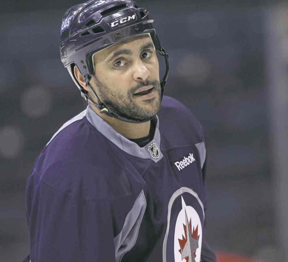 JOE BRYKSA / WINNIPEG FREE PRESS files
Dustin Byfuglien will be sidelined for two to four weeks due to an upper-body injury.