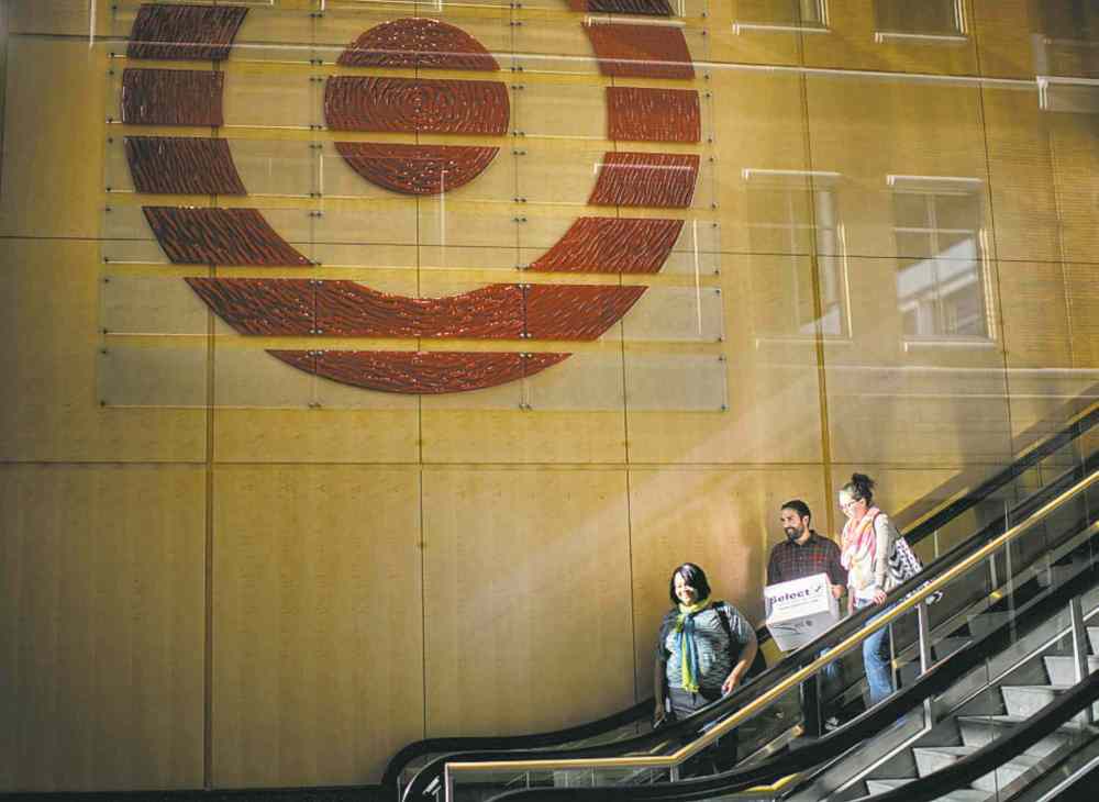 Glen Stubbe / Star Tribune
People leave Target's downtown Minneapolis corporate headquarters Tuesday.