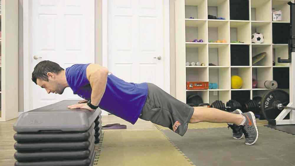 Tim Shantz performs the push-up.