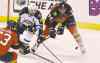 CP
J Pat Carter / the associated press
Winnipeg captain Andrew Ladd battles with Florida�s Erik Gudbranson (right) and Dave Bolland during the third period in Sunrise, Fla., Thursday night.