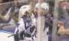 The Associated Press
J Pat Carter / the associated press
Winnipeg�s Drew Stafford is reflected in the glass as he and Michael Frolik (67) celebrate Stafford�s game-tying goal against the Florida Panthers Thursday.