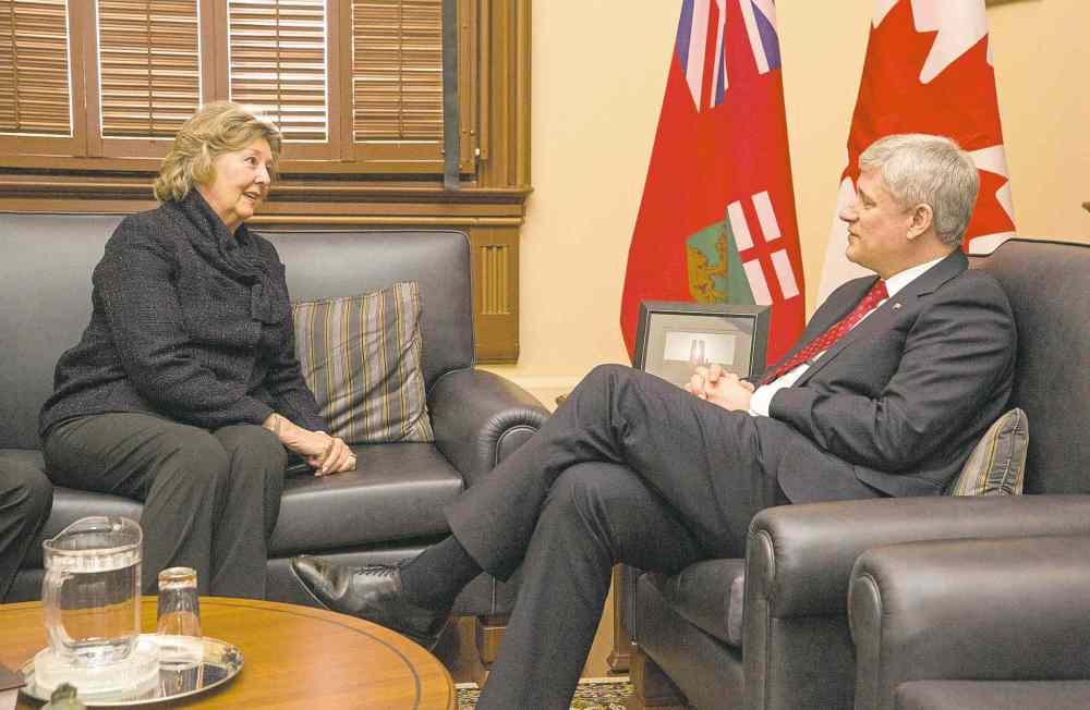 Deb Ranson photo / The Canadian Press handout
Prime Minister Stephen Harper chats with Janice Filmon, Manitoba�s new lieutenant-governor.