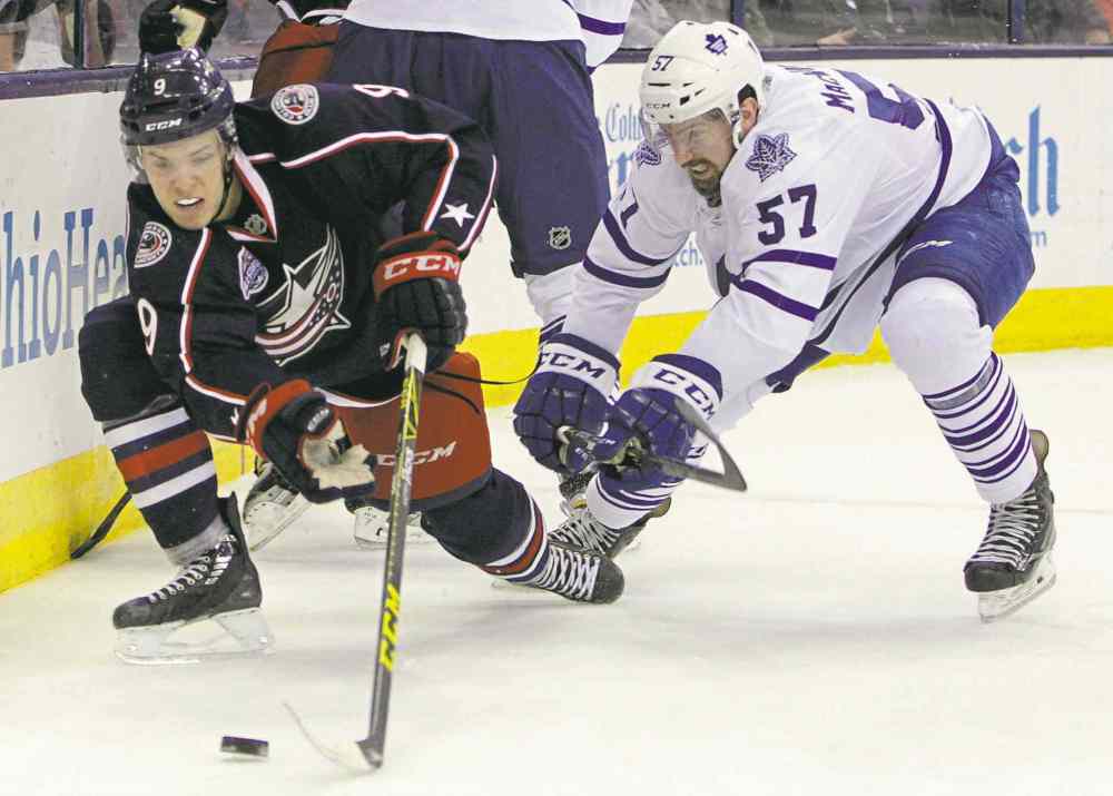 CP
Andrew MacWilliam chase the puck during an NHL game at Nationwide Arena in Columbus.