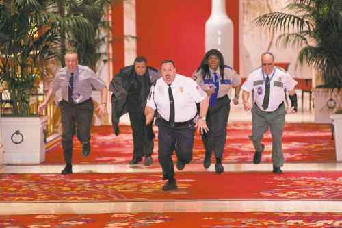 Columbia Pictures 
Paul Blart (Kevin James) with, from left, Gino Chizetti (Vic Dibitetto), Khan Mubi (Shelly Desai), Donna Ericone (Loni Love) and Saul Gundermutt (Gary Valentine) do a little aerobics instead of comedy.