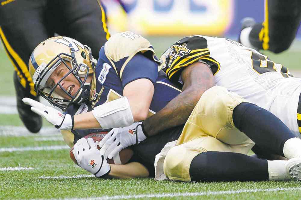 John Woods / The Canadian Press Files
Winnipeg Blue Bombers quarterback Drew Willy was punished with relentless regularity last season.