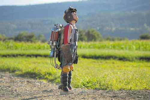 Kimberley French / Disney
Thomas Robinson, as young Frank Walker, prepares to try out  his jetpack in Tomorrowland.