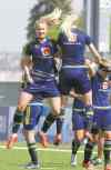 Feeling jumpy: Sweden�s Emma Lund (left) goes through a drill with a teammate during a workout held at the  Winnipeg Soccer Complex on Friday.