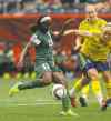 MIKE DEAL / WINNIPEG FREE PRESS
mike deal / winnipeg free pressNgozi Okobi begins the Nigerian comeback with a goal to open the second half, sprinting past Swedish defender Nilla Fischer.