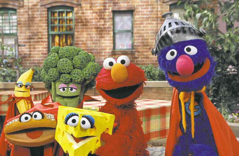 CP
FILE - This June 22, 2010 file photo released by Sesame Workshop, �Sesame Street� characters Elmo, second from right, and Super Grover, right, pose with four new muppets representing healthy food groups; fruits, vegetables, dairy, and grains as part of their �Food For Thought: Eating Well on a Budget� initiative in New York. Sesame Street continues to attract millions of viewers after 45 years on the air, appealing to both preschoolers and their parents with content that is educational and entertaining. The show has kept up with the times by making its segments faster-paced, by fine-tuning messages, and by keeping a steady flow of appearances by contemporary celebrity guests. The show first aired Nov. 10, 1969. (AP Photo/Sesame Workshop, Richard Termine, File)