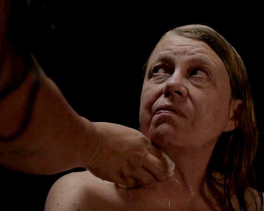 In the sensitively filmed Touch Me, Reece carefully bathes a white woman on a darkened soundstage, an ambivalent exchange that seems at once painful and cathartic, tense and tender.