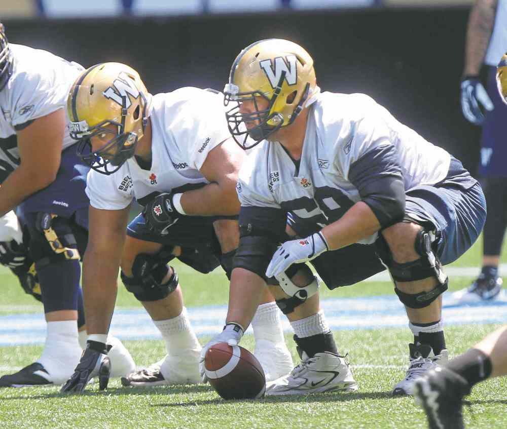 Wayne Glowacki / Winnipeg Free Press
Dominic Picard (right) and Sukh Chungh line up during Winnipeg Blue Bomber practice at Investors Group Field Wednesday.