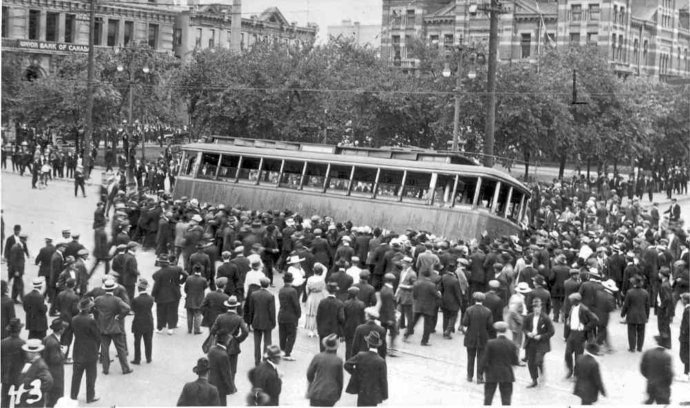 Winnipeg Free Press
A streetcar is overturned in 1919 in the Winnipeg General Strike in front of the old city hall building on Main Street.