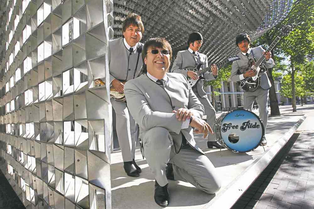 RUTH BONNEVILLE / WINNIPEG FREE PRESS
Free Ride, from left - Wayne Hlady (Ringo) - heavy set guy in front, Jerry Hlady  (John) with black guitar, Randy Moroz (Paul) - bass and Tom Pshednovak (George) - rear. August  03,, 2013 Ruth Bonneville Winnipeg Free Press
