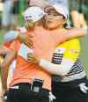 CP
Chris Dunn / the associated pressStacy Lewis (left) and Amy Yang embrace Saturday after finishing the third round of the U.S. Women�s Open in Lancaster, Pa.