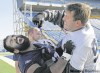 JOE BRYKSA / WINNIPEG FREE PRESS 
Comedian and nose tackle Doug Brown, the East Division’s Most Outstanding Defensive Player, teaches offensive lineman Obby Khan who’s boss Tuesday after practice.