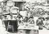 CP
KYODO NEWS / THE ASSOCIATED PRESS FILES People listen to emperor Hirohito announce Japan�s surrender in a radio address on Aug. 15, 1945.