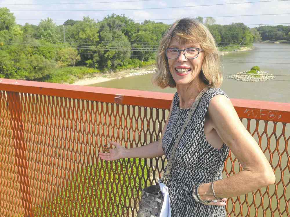 Charlotte Westdal and the area on the bridge where the love locks were before the city took them all down.
