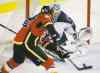Jeff McIntosh / The Canadian Press
Winnipeg Jets goalie Ondrej Pavelec blocks the net on a shot from the Flames' Brandon Bollig during NHL pre-season action in Calgary Saturday.