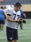 JOE BRYKSA / WINNIPEG FREE PRESS
Former U of M Bison Alex Vitt takes the field for the Winnipeg Blue Bombers rookie camp Thursday.