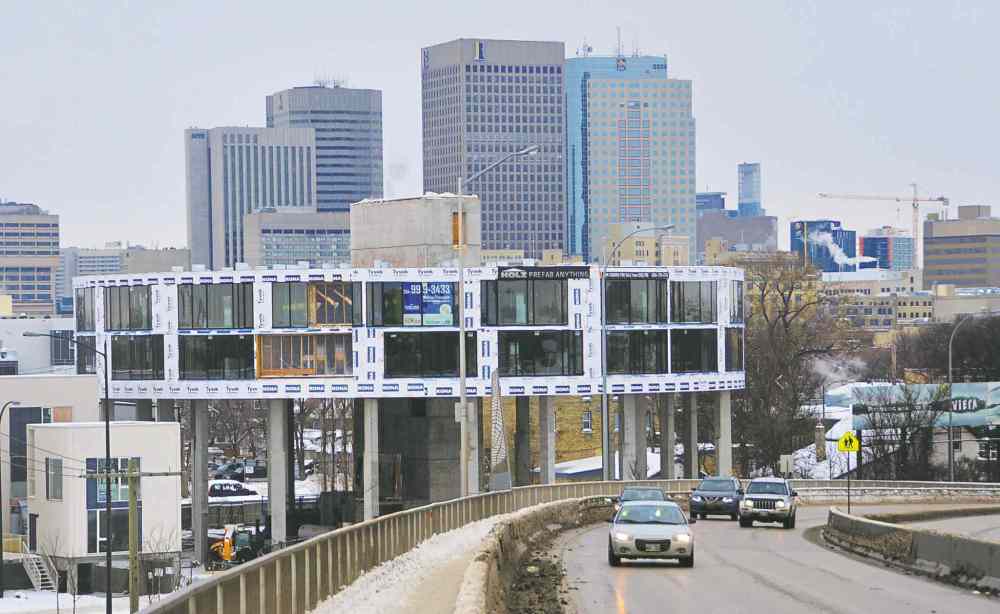 brent bellamy photo
The 'flying saucer' under construction at the base of the Disraeli Freeway is among the many new developments making a mark on Winnipeg's skyline.