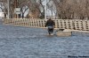 JOHN WOODS / THE CANADIAN PRESS ARCHIVES
A resident of Morris pulls a boat down Highway 75 across the Morris River bridge to his business, which was left isolated by flood water, during last spring’s flooding.
