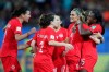 Canada's Nichelle Prince, right, celebrates with her teammates after scoring her side's second goal during the Women's World Cup Group E soccer match between Canada and New Zealand in Grenoble, France, Saturday, June 15, 2019. (AP Photo/Francisco Seco)