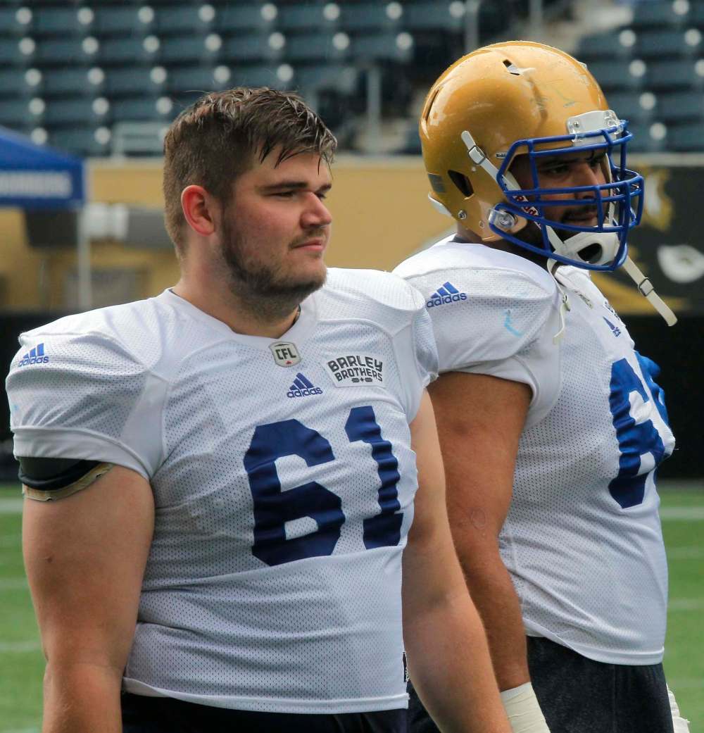 BORIS MINKEVICH / WINNIPEG FREE PRESS
#61 Matthias Goossen and #69 Sukh Chungh.