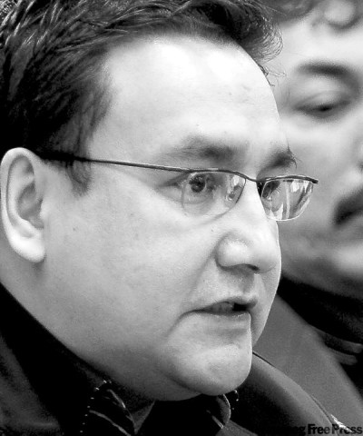 MIKE DEAL / WINNIPEG FREE PRESS 0601013 Chief David Harper talks to the media about the dire situation northern communities are facing because of the lack of winter roads which are the main means of access for most supplies. GMC Acting Grand Chief Dennis Meeches of Long Plains is in the background.