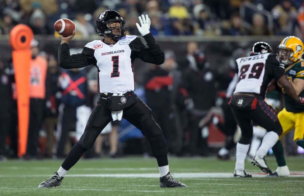 Darryl Dyck
/ The Canadian Press
Ottawa Redblacks' quarterback Henry Burris throws the ball during the 103rd Grey Cup against the Edmonton Eskimos in Winnipeg, Man. Sunday, Nov. 29, 2015.