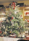 The Associated PRess
There's no rule, of course, about how long to keep a Christmas tree -- but In many homes, the tree goes out along with the old year.