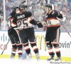 NAM Y. HUH / THE ASSOCIATED PRESS
Chicago’s Ben Eager (right) celebrates his goal with Blackhawks teammates Brian Campbell and Cam Barker during the first period of the NHL Winter Classic against the Detroit Red Wings at Wrigley Field on Thursday.