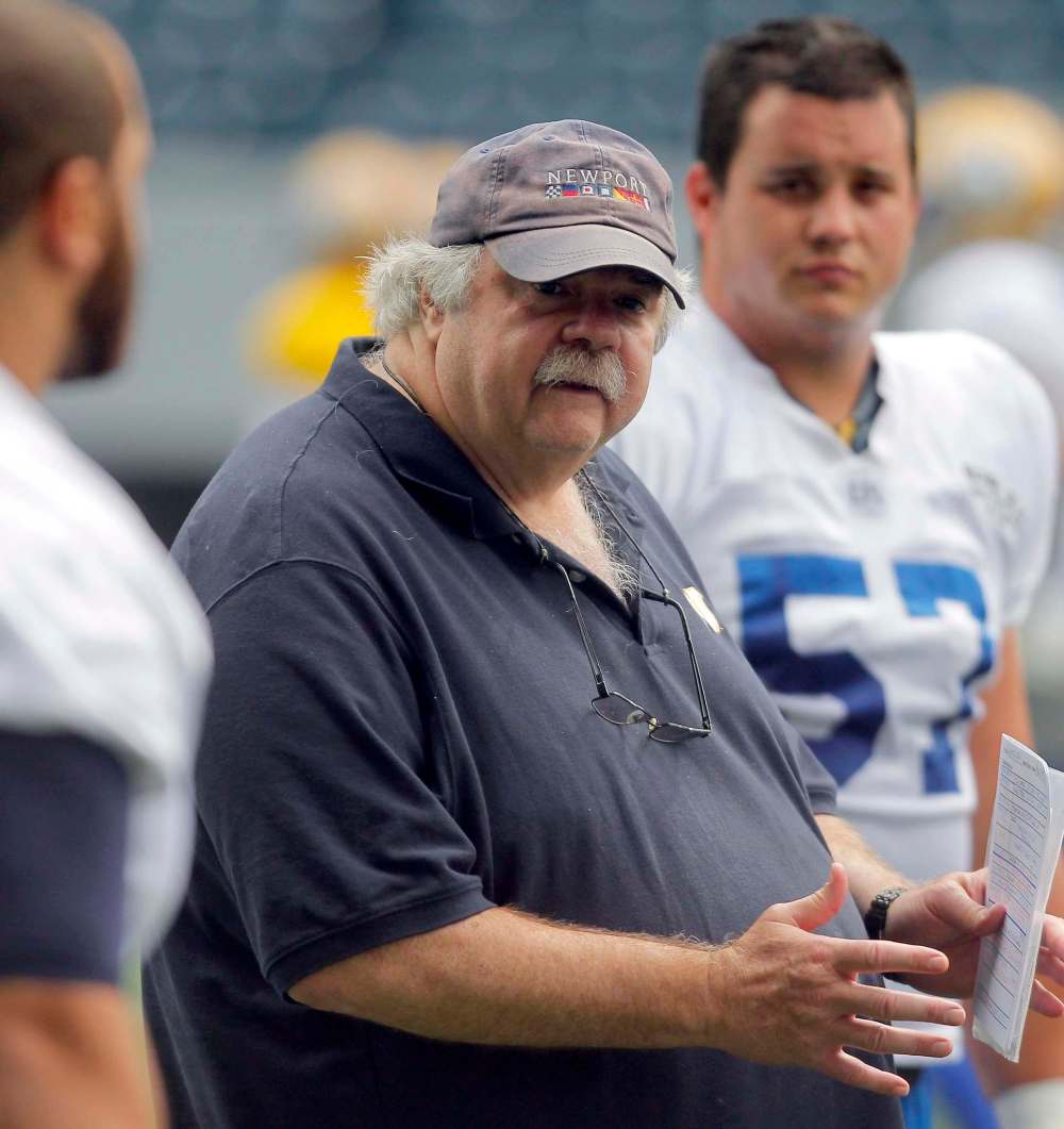 BORIS MINKEVICH / WINNIPEG FREE PRESS
Offensive Line Coach Bob Wylie is protective of his stable of big guys.