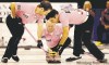 PHIL HOSSACK / WINNIPEG FREE PRESS 
Glenn Howard peers between his sweepers Thursday night at MTS Centre. Howard dropped a 7-6 decision to Winnipeg's red-hot Mike McEwen, who curled 100 per cent to improve to 2-1.