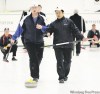 BORIS MINKEVICH / WINNIPEG FREE PRESS 
Deaf curlers David Joseph (left) and Damian Hum comment with hand signals on their rock's progress on the opening day of the 2009 MCA Bonspiel Thursday.