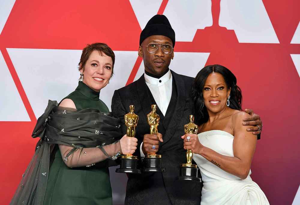 Olivia Colman poses with the award for best performance by an actress in a leading role for The Favourite, Mahershala Ali poses with the award for best performance by an actor in a supporting role for Green Book, and Regina King poses with the award for best performance by an actress in a supporting role for If Beale Street Could Talk at the Oscars on Sunday. (Jordan Strauss/Invision/AP)