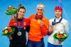 New world champion and gold medal, Netherlands' Irene Schouten, center, silver medal Canada's Ivanie Blondin, left, and bronze medal Elizaveta Kazelina of Russia, right, pose after the podium ceremony of the women's mass start race at the ISU single distance Speedskating World Championships in Inzell, Germany, Sunday, Feb. 10, 2019. (AP Photo/Matthias Schrader)