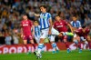 Real Sociedad's Mikel Oyarzabal, kicks the ball to score the third for his team during the Spanish La Liga soccer match between Real Sociedad and Alaves at Reale Arena stadium, in San Sebastian, northern Spain, Thursday, Sept. 26, 2019. (AP Photo/Alvaro Barrientos)