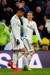 Real Madrid's Luka Modric, right, celebrates his goal with his teammate Casemiro during the La Liga soccer match between Real Madrid and Sevilla at the Bernabeu stadium in Madrid, Spain, Saturday, Jan. 19, 2019. (AP Photo/Andrea Comas)