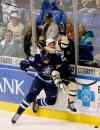 Andrew Krech / The Citizens' Voice
St. John's IceCaps' Ben Chiarot hits Wilkes-Barre/Scranton Penguins' Bobby Farnham during an AHL hockey Eastern Conference finals playoff game in May. He played one game for the Jets last year.