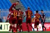 Roma players celebrate after their teammate Javier Pastore scored his side's second goal during a Serie A soccer match between Roma and Cagliari, at Rome's Olympic Stadium, Saturday, April 27, 2019. (AP Photo/Gregorio Borgia)