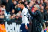 Tottenham's manager Jose Mourinho, right, accompanies Tottenham's Dele Alli as he leaves the field during the English Premier League soccer match between West Ham and Tottenham, at London stadium, in London, Saturday, Nov. 23, 2019.(AP Photo/Frank Augstein)