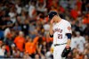 Houston Astros starting pitcher Zack Greinke reacts after giving up a home run to New York Yankees' Giancarlo Stanton during the sixth inning in Game 1 of baseball's American League Championship Series Saturday, Oct. 12, 2019, in Houston. (AP Photo/Matt Slocum)