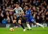 Newcastle United's Isaac Hayden, left, and Chelsea's Willian compete for the ball during the English Premier League soccer match between Chelsea and Newcastle United at Stamford Bridge stadium in London, Saturday, Jan. 12, 2019. (AP Photo/Matt Dunham)
