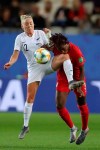 Canada's Kadeisha Buchanan compete for the ball with New Zealand's Betsy Hassett during the Women's World Cup Group E soccer match between Canada and New Zealand in Grenoble, France, Saturday, June 15, 2019. (AP Photo/Francisco Seco)