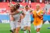 England players celebrate at the end of the Women's World Cup round of 16 soccer match between England and Cameroon at the Stade du Hainaut stadium in Valenciennes, France, Sunday, June 23, 2019. England beat Cameroon 3-0. (AP Photo/Michel Spingler)
